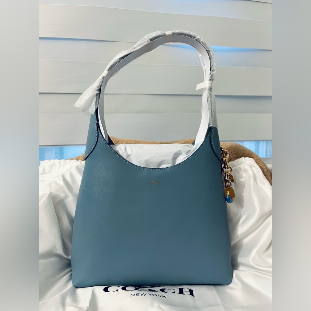 SOLD- Coach Brooklyn size 28